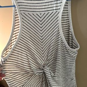 Very cute cotton sleeveless blouse. White with thin black stripes